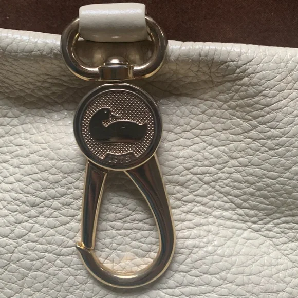 Dooney & Bourke Pebble Grain Logo Lock Bag - Bone - Picture 11 of 14